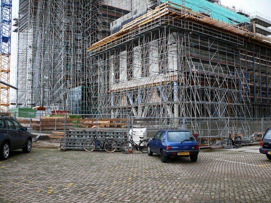 Scaffolding surrounding a building under construction